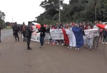 Vecinos exigen compras de propiedades que ocupan