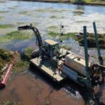 Draga anfibia Yacyretá XX se une a labores de limpieza en subembalse del Potiy